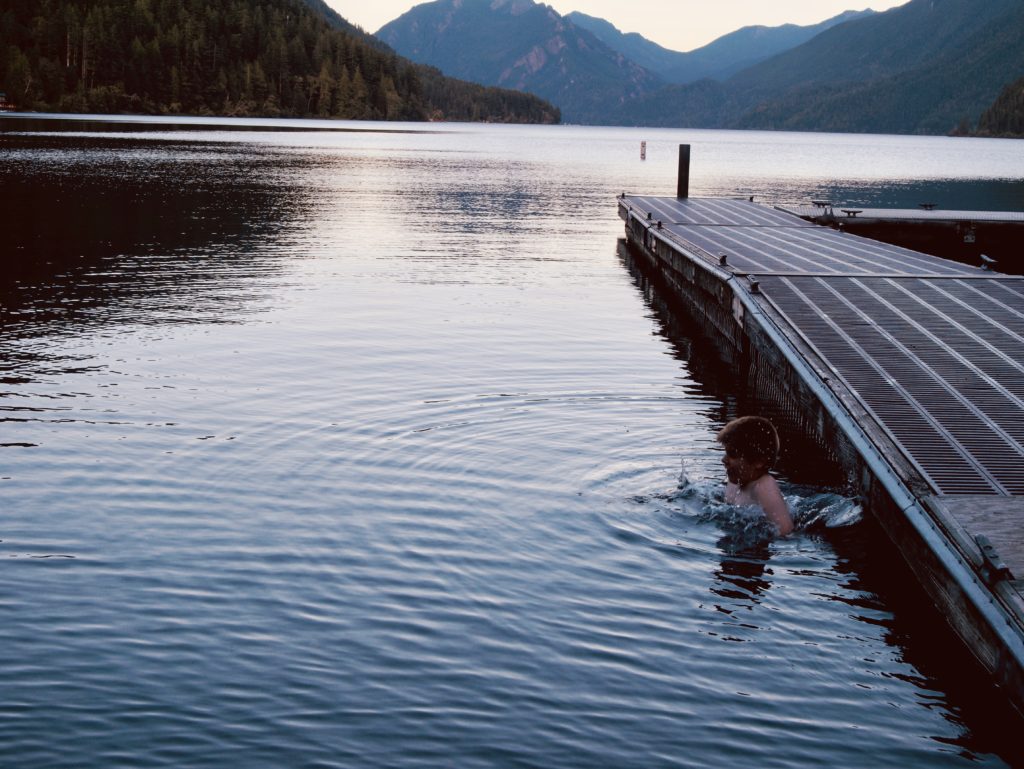 The boy taking a cold plunge into Lake Crescent
